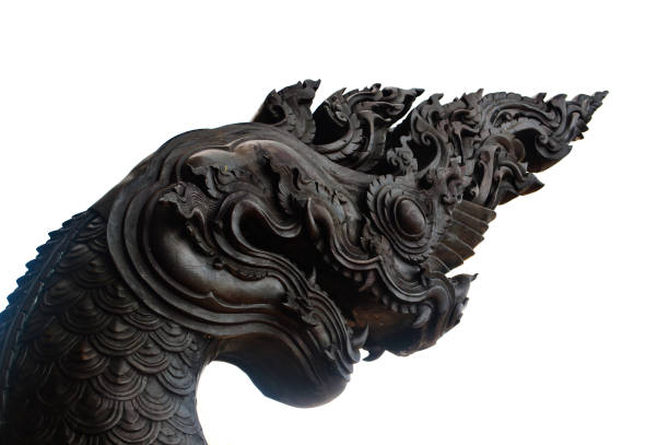 istock black king of Nagas Statue on white background 1071228570