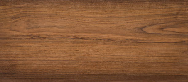 istock Walnut wood texture. Super long walnut planks texture background. 1071233278