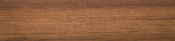istock Walnut wood texture. Super long walnut planks texture background. 1071233414