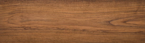 istock Walnut wood texture. Super long walnut planks texture background. 1071234626