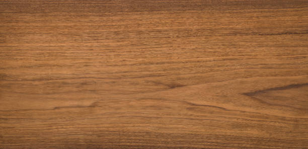istock Walnut wood texture. Super long walnut planks texture background. 1071235786
