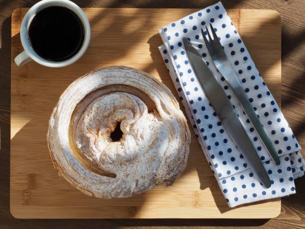 Pastry bread and fork and coffee