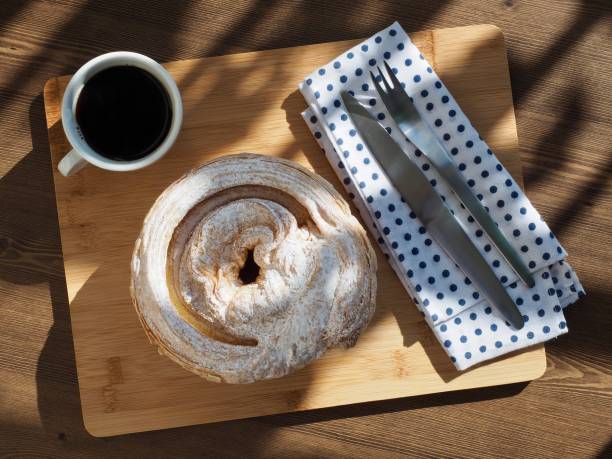 Pastry bread and fork and coffee