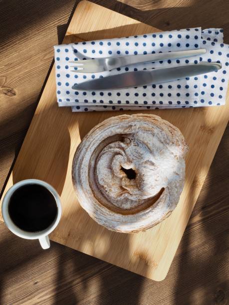 Pastry bread and fork and coffee