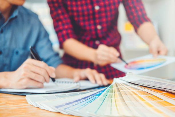 istock Two Graphic designer Brainstorming Meeting and drawing on graphics tablet at workplace 1071237952