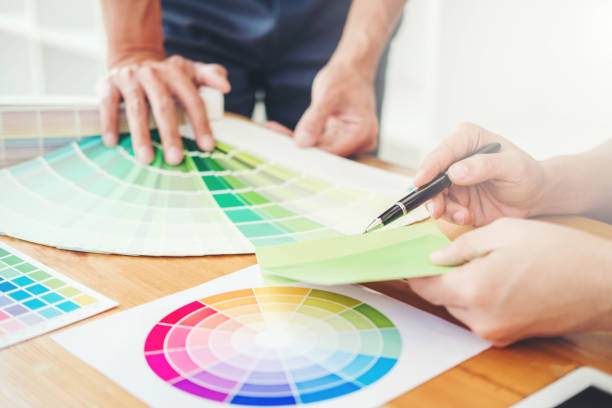 istock Two Graphic designer Brainstorming Meeting and drawing on graphics tablet at workplace 1071237966