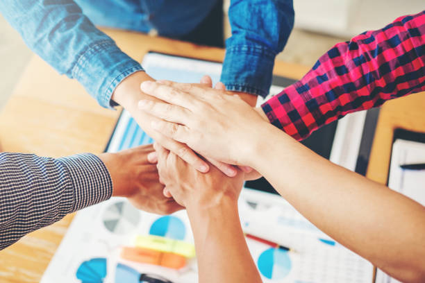 istock Business Teamwork joining hands team spirit Collaboration Concept 1071238028