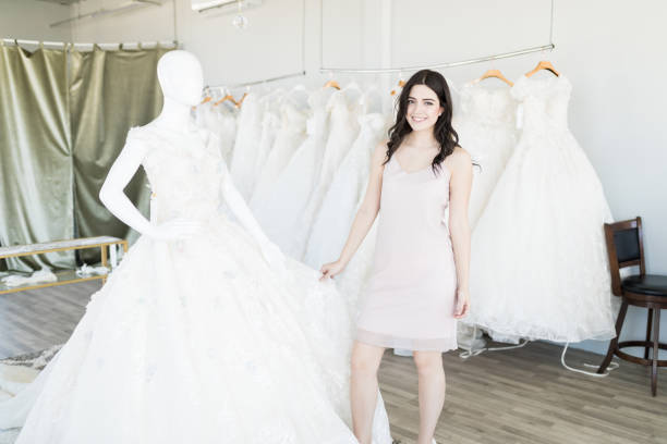 istock Woman Shopping For Expensive Wedding Attire 1071242464