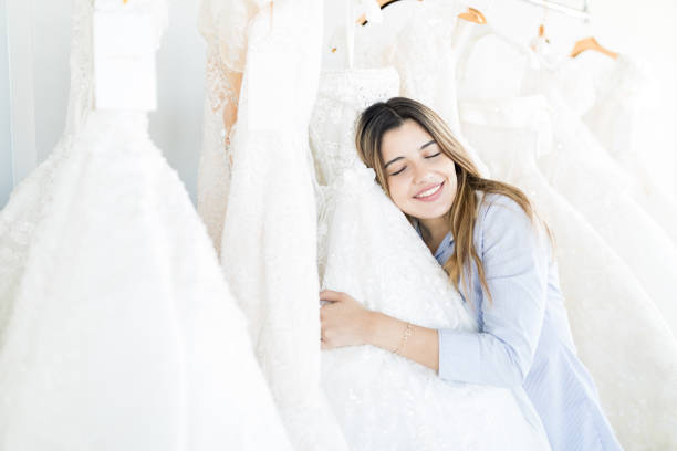 istock Woman Showing Contentment After Selecting Her Bridal Gown 1071242482