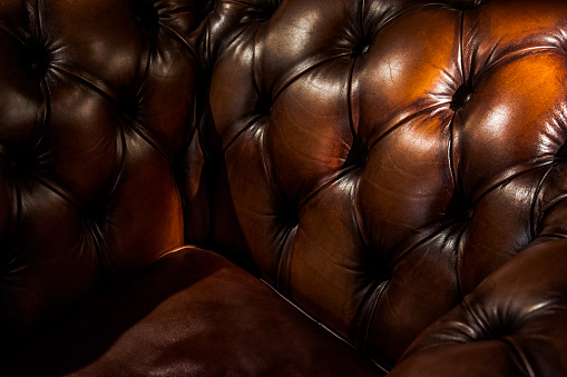 Close-up of a luxury leather armchair - Chesterfield style