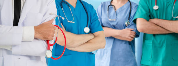 istock Doctor working in hospital with other doctors. 1071246188