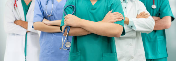 istock Doctor working in hospital with other doctors. 1071246214