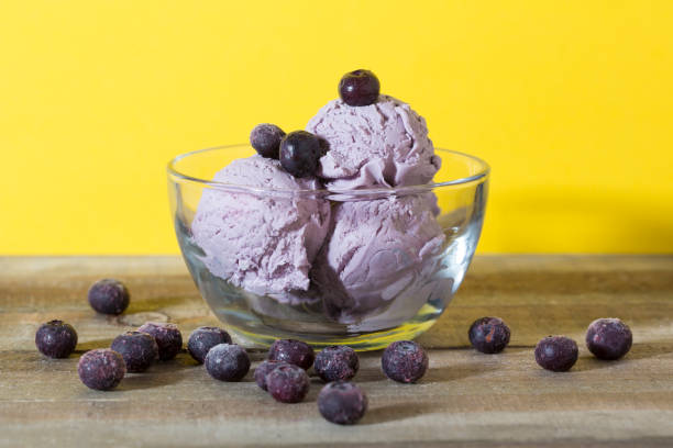 istock Blueberry Ice Cream in a Clear Bowl 1071248994