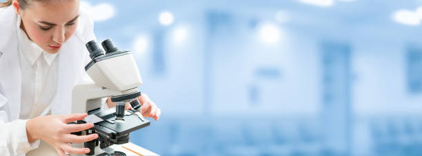 istock Scientist researcher uses microscope in laboratory 1071249118