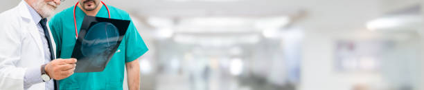 istock Doctors at hospital working with another doctor. 1071249266