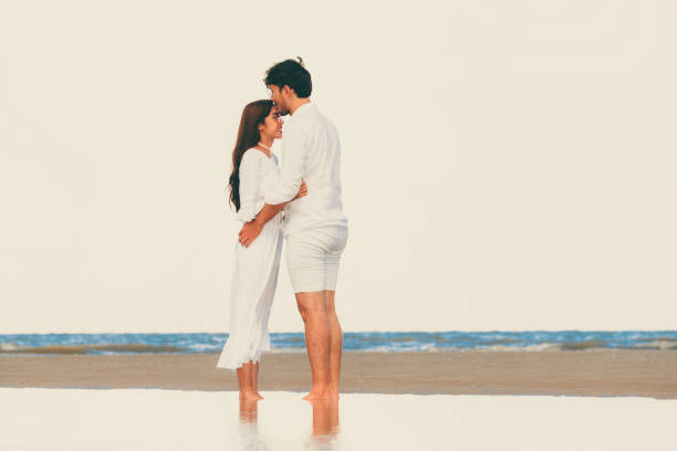 istock Couple going honeymoon on tropical beach in summer 1071249332