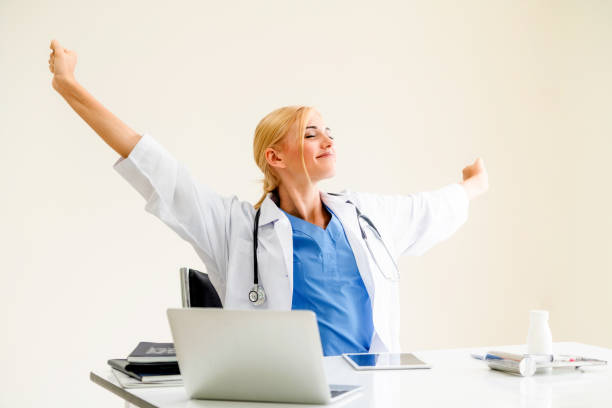 istock Relaxed doctor taking a break in hospital office. 1071252396