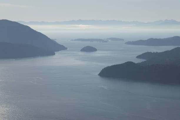 Scenic view of sea and islands from a mountain summit.