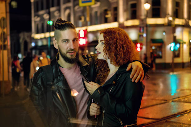istock Couple smokes electronic cigarette 1071254442