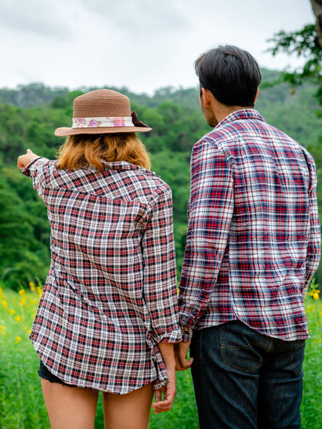 istock Happy couple take a romantic walk on the hills. 1071256644