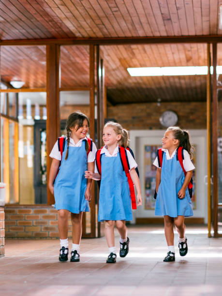 istock Happy girls going to school. 1071267868