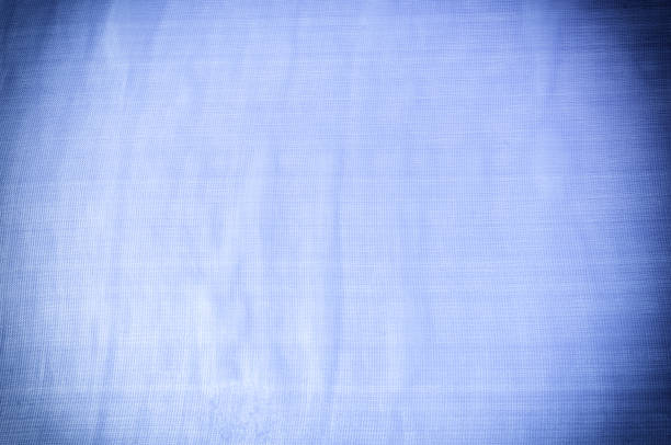 istock Background texture, pattern. Blue silk fabric. Smooth elegant blue silk or satin can use as background. Luxurious Christmas background or New Year background design 1071272592