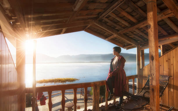 istock Woman by the lake 1071272822