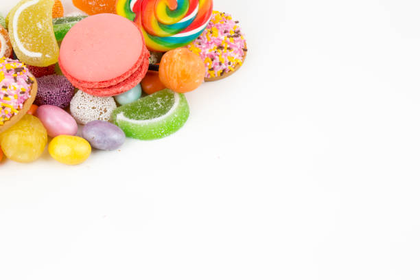 Colorful lollipops and different colored round candy. Top view.