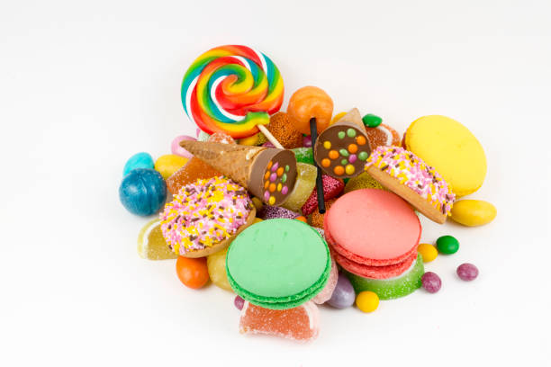 istock Colorful lollipops and different colored round candy. Top view. 1071273150