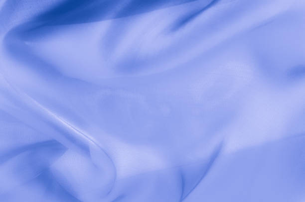 istock Texture, background, pattern. Pale blue clear silk cloth. SKY BLUE, also known as PALE BLUE, BABY BLUE, POWDER BLUE 1071273342