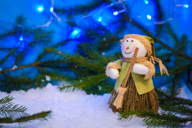 istock Christmas winter picture with a snowman on a blue background 1071284214