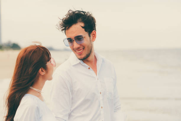 istock Couple going honeymoon on tropical beach in summer 1071284306