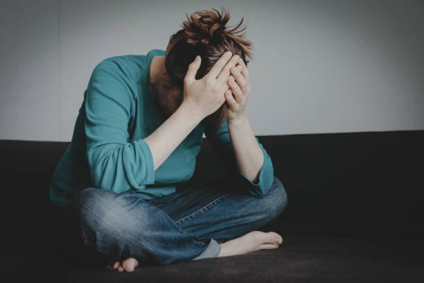 istock stressed sad woman, despair and depression, sorrow 1071287504