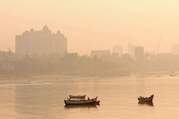 Saifee Hospital as a Silhouette due to winter smog as seen from Chowpatty beach.