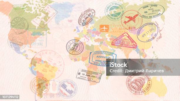 World Map With Visas Stamps Seals Travel Concept Stock Photo - Download Image Now