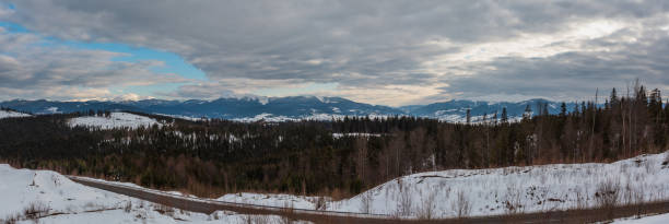 Evening winter cloudy day mountain ridge