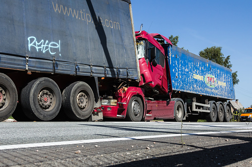 The collision of two trucks in Latvia, on the A8 road, occurred on August 23, 2018.The truck driver Iveco saw people on the pedestrian crossing and braked sharply, behind the driver who was driving Scania did not observe the distance and ran into Iveco. both drivers stayed alive