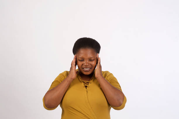 istock Beautiful African woman deep etch migraine 1071303988