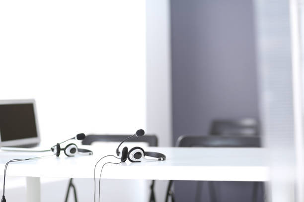 istock Communication support, call center and customer service help desk at empty office with no operators 1071315544
