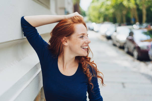 istock Smiling vivacious woman looking off to the side 1071318764