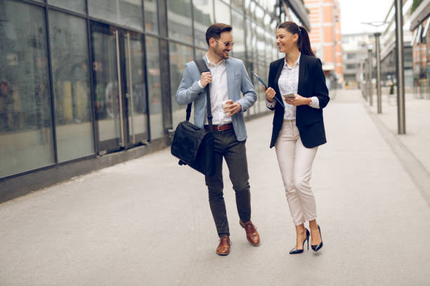 istock Two business people on their way to work 1071322308