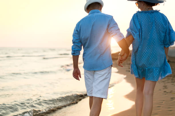 istock Happy couple on the beach 1071322330