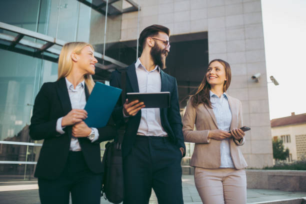 istock Discussing business outdoors 1071323436