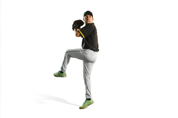 one caucasian man baseball player playing in studio The fit caucasian man baseball player playing in studio. silhouette isolated on white background men baseball baseball cap baseball bat stock pictures, royalty-free photos & images