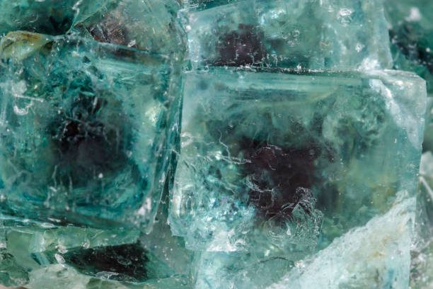 istock Macro mineral stone Fluorite on a white background 1071327522