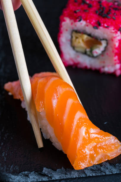istock A variety of sushi and rolls on a dark background 1071327656