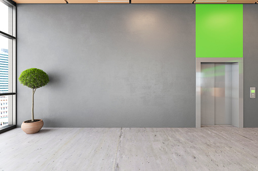 Oficina abierta ecológico interior de espacio lobby con piso de concreto, techo de madera, recepción, ascensor. photo