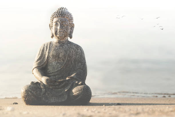 istock Buddha temple on the beach facing the ocean 1071348514