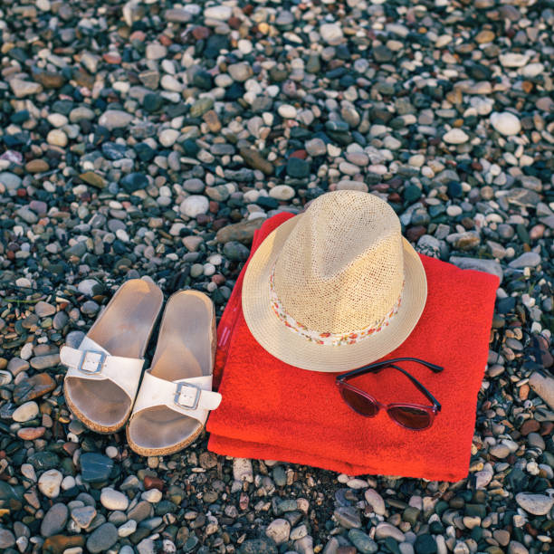 istock Beach accessories in the sand against 1071348802