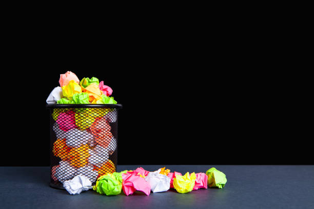 istock paper in the trash and idea 1071350984